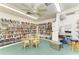 Cozy library with extensive bookshelves, offering a quiet space for reading and studying at 9409 Catalina Dr, Bradenton, FL 34210