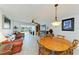 Cozy living room with a dining table offering a comfortable space for relaxation and enjoying meals with Gathering and friends at 9409 Catalina Dr, Bradenton, FL 34210