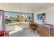 Bright office space with waterfront views, wood-look floors and a comfortable seating area at 9409 Catalina Dr, Bradenton, FL 34210