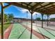 Covered shuffleboard courts with seating areas for community recreation at 9409 Catalina Dr, Bradenton, FL 34210