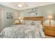Inviting bedroom featuring a king-size bed, two side tables, and soft, neutral decor at 9620 Club South Cir # 5304, Sarasota, FL 34238
