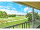 Enjoy the tranquil golf course and lake views from this screened balcony overlooking lush greenery and blue skies at 9620 Club South Cir # 5304, Sarasota, FL 34238