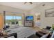 Open living area with a view to the balcony and adjoining bedroom at 9620 Club South Cir # 5304, Sarasota, FL 34238