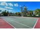 Well-maintained community tennis court for active recreation and enjoyment in a beautifully landscaped setting at 9620 Club South Cir # 5304, Sarasota, FL 34238