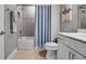 Cozy bathroom features a shower and tub combo with modern fixtures and stylish decor at 10414 Spring Tide Way, Parrish, FL 34219