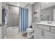 A simple bathroom featuring gray paint, a shower/tub combination, and chrome hardware at 10414 Spring Tide Way, Parrish, FL 34219
