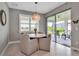 Inviting dining area next to sliding glass doors offering access to the lanai, perfect for indoor-outdoor living at 10414 Spring Tide Way, Parrish, FL 34219