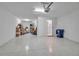 Spacious garage offering ample storage space and convenient access to the home's interior at 10414 Spring Tide Way, Parrish, FL 34219