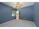 Bedroom with carpet, a ceiling fan, and natural light from window at 11342 77Th E St, Parrish, FL 34219
