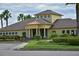 Attractive clubhouse exterior with beautiful landscaping and inviting entrance at 11342 77Th E St, Parrish, FL 34219