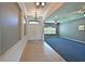 Inviting foyer with tile flooring that leads to a spacious living area at 11342 77Th E St, Parrish, FL 34219