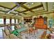 Spacious living room area in the clubhouse with comfortable seating and stylish decor at 11342 77Th E St, Parrish, FL 34219