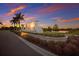 Savanna at Lakewood Ranch community sign with manicured landscaping and a tranquil lake in the background at 13706 American Prairie Pl, Lakewood Ranch, FL 34211