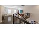 Spacious game room with wood floors, natural light, foosball table, television and comfortable seating at 13706 American Prairie Pl, Lakewood Ranch, FL 34211