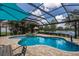 Gorgeous pool with an attached spa in a screened enclosure offering stunning water views at 13706 American Prairie Pl, Lakewood Ranch, FL 34211