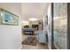 Welcoming entryway showcasing elegant decor, neutral tones, and a glimpse into the spacious living area at 13848 American Prairie Pl, Lakewood Ranch, FL 34211