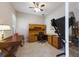 Bright office space with multiple desks and room for treadmill or other exercise equipment at 13848 American Prairie Pl, Lakewood Ranch, FL 34211
