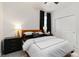 Bedroom with neutral colors, a ceiling fan, a large bed, and plenty of natural light at 14314 17Th E Ct, Parrish, FL 34219