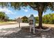 Community park with a bookshare box, covered picnic area, and playground under a clear sky at 14314 17Th E Ct, Parrish, FL 34219