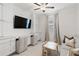 Versatile flex room featuring built-in cabinets, a desk, and ample storage space at 14314 17Th E Ct, Parrish, FL 34219