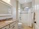 Bathroom with a vanity, a shower and tub combination, and a single window at 14325 Stirling Dr, Lakewood Ranch, FL 34202