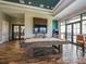 Entertainment game room with pool table, TV, and stylish wood-look tile floor at 14325 Stirling Dr, Lakewood Ranch, FL 34202