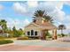 The charming guard house entrance to this gated community provides security and a welcoming arrival at 14325 Stirling Dr, Lakewood Ranch, FL 34202