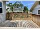 Spacious backyard deck, perfect for outdoor relaxation and entertaining, with lush garden views at 1512 18Th W Ave, Bradenton, FL 34205