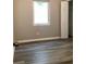 A cozy bedroom with durable floors, one window, and a built-in closet at 1512 18Th W Ave, Bradenton, FL 34205