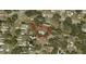 Aerial view of the home lot with surrounding houses in the community at 15718 Squirrel Tree Pl, Tampa, FL 33624
