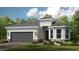 Inviting single-story home featuring a gray roof, stone accents, and a well-manicured lawn at 16404 Isola Pl, Bradenton, FL 34211