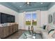 Cozy room features a view of the golf course, modern decor, and comfortable furnishings at 16404 Isola Pl, Bradenton, FL 34211