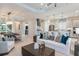 Open-concept living room with a view of the kitchen and dining area at 16404 Isola Pl, Bradenton, FL 34211