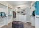 Spacious walk-in closet with built-in shelving, drawers, and plenty of storage space at 16404 Isola Pl, Bradenton, FL 34211