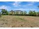 Expansive backyard offering plenty of space for recreation and outdoor activities with a green lawn at 168 Wading Bird Dr, Venice, FL 34292