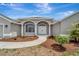 Charming single-story home with a well-manicured front yard and inviting entrance at 168 Wading Bird Dr, Venice, FL 34292