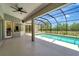 Screened-in pool with a covered patio adjacent to the home, offering a shady outdoor retreat at 168 Wading Bird Dr, Venice, FL 34292