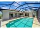 Enclosed backyard pool with steps offers a private retreat for relaxation and enjoyment at 168 Wading Bird Dr, Venice, FL 34292