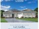 A charming one-story home featuring a three car garage, well manicured yard, and ample windows at 17719 Palmiste Dr, Bradenton, FL 34202