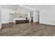 Open-concept living space showcasing the kitchen, featuring hardwood floors and recessed lighting at 17719 Palmiste Dr, Bradenton, FL 34202