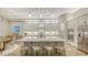 Modern eat-in kitchen featuring stainless appliances, granite counters and a large center island with seating at 17811 Roost Pl, Bradenton, FL 34211