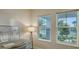 Home office bathed in light, offering an artful aesthetic and serene views at 17811 Roost Pl, Bradenton, FL 34211