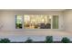 View of a large open concept living space through sliding glass doors from the covered back patio at 17811 Roost Pl, Bradenton, FL 34211