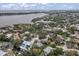 Stunning aerial view of home with waterfront access to canal and bay views at 1809 Buccaneer Ter, Sarasota, FL 34231