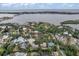 Aerial view showcasing a home's location near the water at 1809 Buccaneer Ter, Sarasota, FL 34231