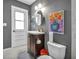 Charming bathroom featuring a modern vanity and stylish decor, creating a welcoming space at 1809 Buccaneer Ter, Sarasota, FL 34231