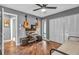 Bedroom featuring guitars, a daybed, and ample closet space, perfect for relaxation and hobbies at 1809 Buccaneer Ter, Sarasota, FL 34231
