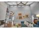 Comfortable living room with vaulted ceiling and modern decor, perfect for relaxation at 1809 Buccaneer Ter, Sarasota, FL 34231