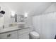 Bathroom featuring vessel sink, modern fixtures, and tiled shower with white subway tile at 1841 Datura St, Sarasota, FL 34239