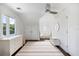 Lovely Bedroom with white dresser, rug, and a cozy baby crib at 1841 Datura St, Sarasota, FL 34239